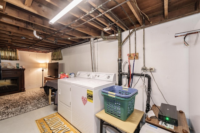 washroom featuring washer and dryer