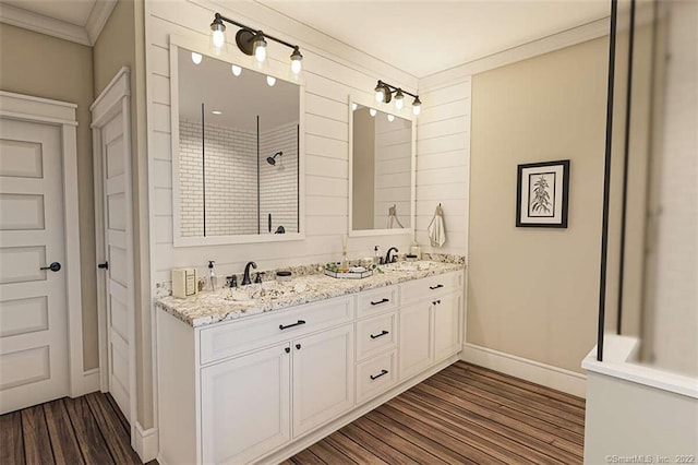 365 Cranberry Bog Rd, Killingly, CT 06239 - bathroom with crown molding, double vanity, wood finished floors, and a shower