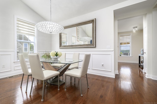 8 Country View Rd Unit 8, Danbury, CT 06810 - dining room with healthy amount of natural light, a decorative wall, a chandelier, vaulted ceiling, and wainscoting