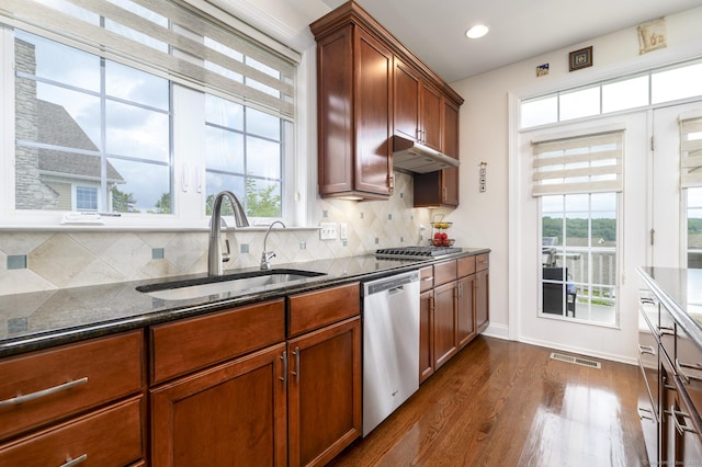 8 Country View Rd Unit 8, Danbury, CT 06810 - kitchen with stainless steel appliances, dark stone countertops, dark wood-style flooring, tasteful backsplash, and recessed lighting