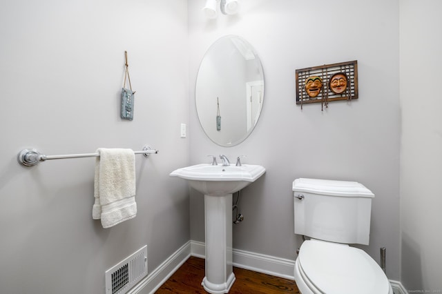 8 Country View Rd Unit 8, Danbury, CT 06810 - half bath featuring toilet and wood finished floors