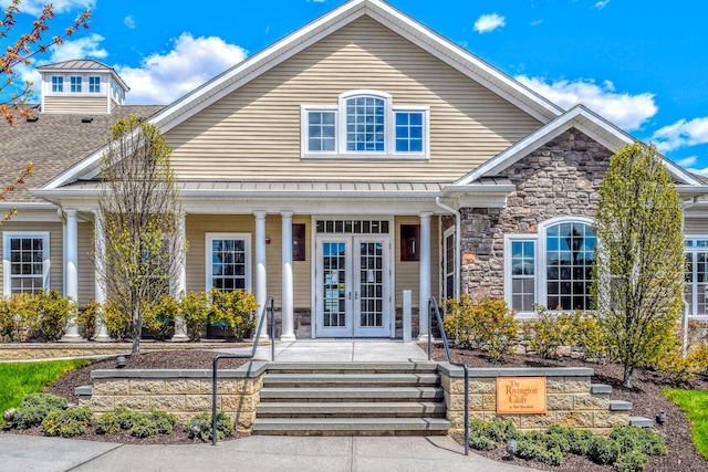 8 Country View Rd Unit 8, Danbury, CT 06810 - view of front of home with covered porch, stone siding, and french doors