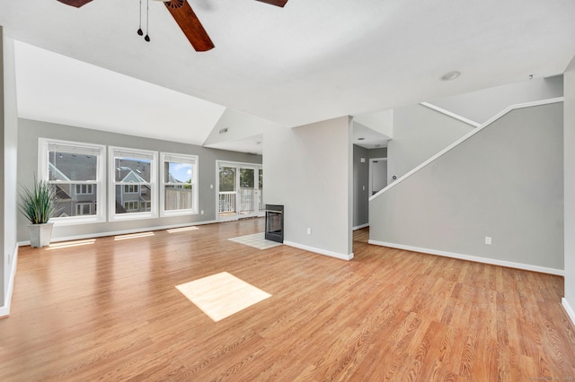 233 Mansfield Grove Rd Unit 306, East Haven, CT 06512 - unfurnished living room featuring ceiling fan, light wood finished floors, and stairs