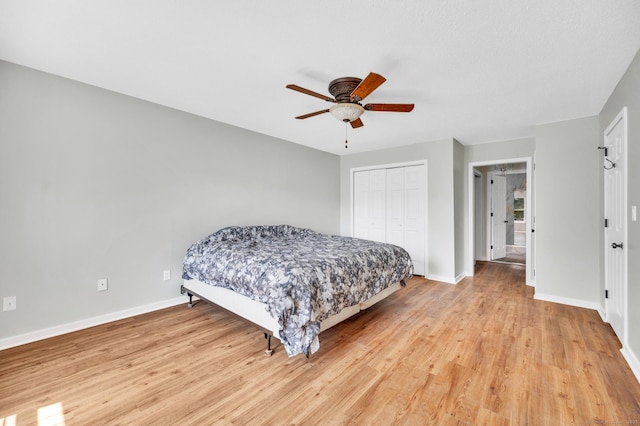 233 Mansfield Grove Rd Unit 306, East Haven, CT 06512 - bedroom with light wood-type flooring, a ceiling fan, and a closet