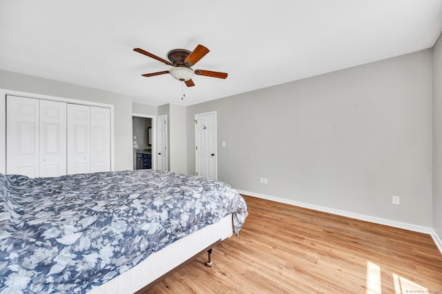 233 Mansfield Grove Rd Unit 306, East Haven, CT 06512 - bedroom featuring light wood-style flooring, a closet, and a ceiling fan