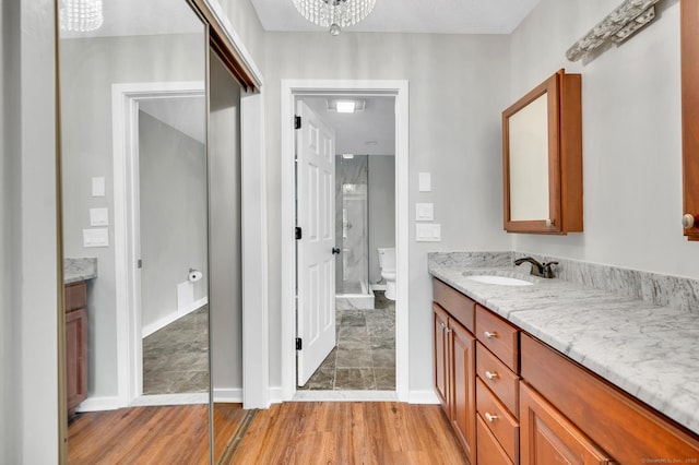233 Mansfield Grove Rd Unit 306, East Haven, CT 06512 - full bathroom featuring vanity and wood finished floors