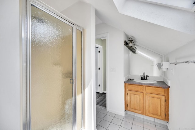 233 Mansfield Grove Rd Unit 306, East Haven, CT 06512 - bathroom featuring lofted ceiling, tile patterned flooring, vanity, and a stall shower