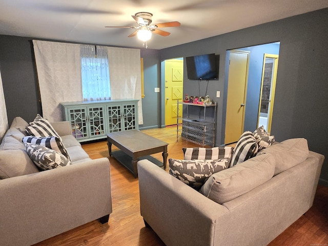 1190 Meriden Rd, Waterbury, CT 06705 - living area with ceiling fan and wood finished floors