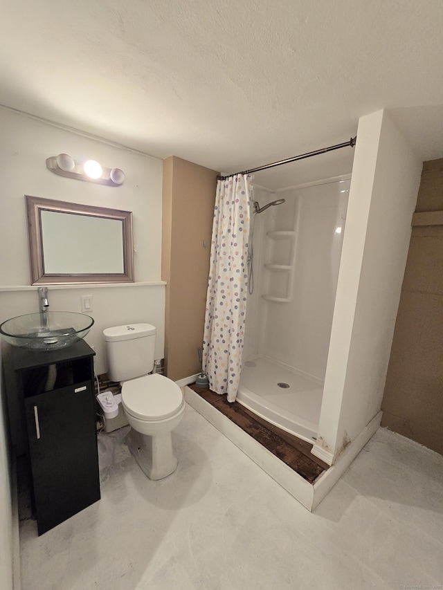 1190 Meriden Rd, Waterbury, CT 06705 - bathroom featuring a stall shower, vanity, concrete flooring, and a textured ceiling