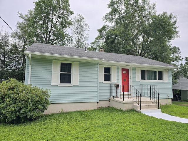 1190 Meriden Rd, Waterbury, CT 06705 - view of front of house featuring a front lawn and a chimney