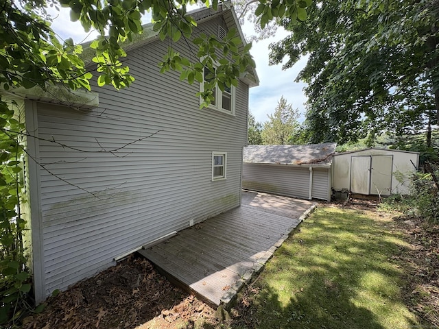 2 Sherwood St, Branford, CT 06405 - view of side of property with a storage shed and a deck