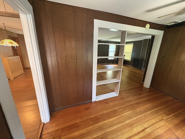 2 Sherwood St, Branford, CT 06405 - corridor featuring wooden walls and hardwood / wood-style flooring