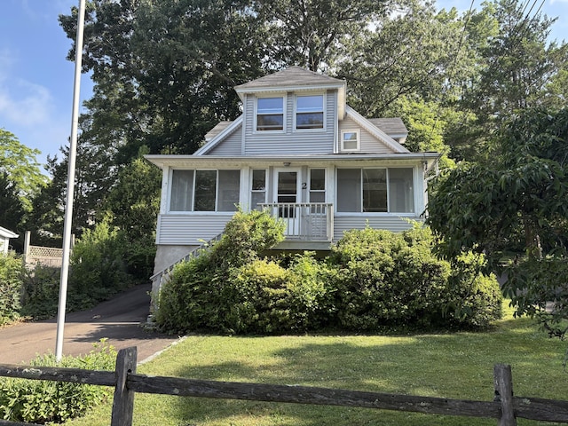 2 Sherwood St, Branford, CT 06405 - view of front facade with a sunroom and driveway