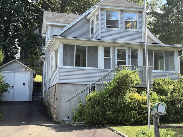 2 Sherwood St, Branford, CT 06405 - view of front of property featuring a sunroom, stairway, and a shed
