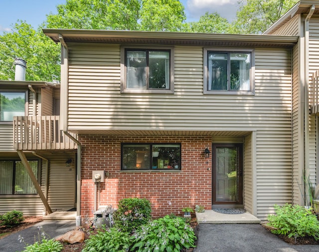14 Conestoga Way Unit 14, Glastonbury, CT 06033 - view of front facade featuring brick siding and a balcony