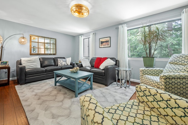 14 Conestoga Way Unit 14, Glastonbury, CT 06033 - living area featuring plenty of natural light and wood finished floors