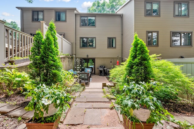 14 Conestoga Way Unit 14, Glastonbury, CT 06033 - back of property with a deck and stairway