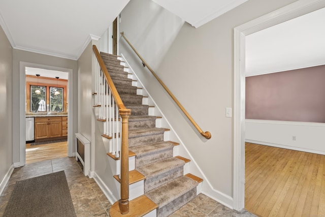 1182 N Main St, West Hartford, CT 06117 - stairs with ornamental molding and wood finished floors
