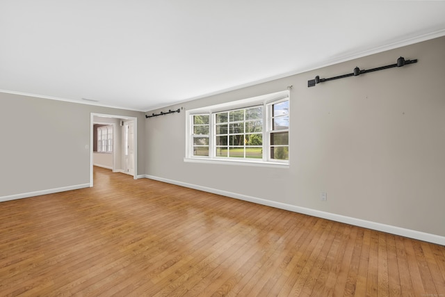 1182 N Main St, West Hartford, CT 06117 - unfurnished room featuring light wood-style floors and ornamental molding
