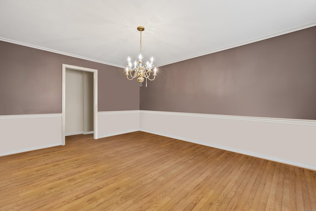 1182 N Main St, West Hartford, CT 06117 - unfurnished room featuring light wood-style floors and a chandelier