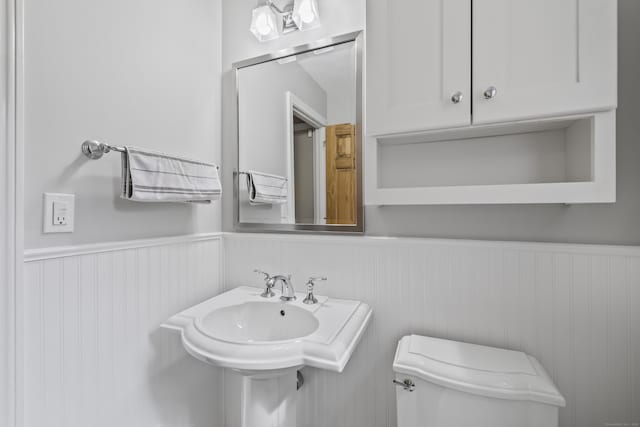 1182 N Main St, West Hartford, CT 06117 - half bath with wainscoting and toilet