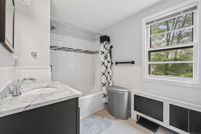 1182 N Main St, West Hartford, CT 06117 - bathroom with a wainscoted wall, radiator, tile patterned flooring, shower / tub combo with curtain, and vanity