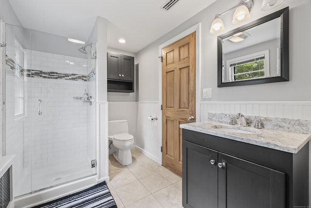 1182 N Main St, West Hartford, CT 06117 - bathroom featuring a shower stall, wainscoting, vanity, and tile patterned floors