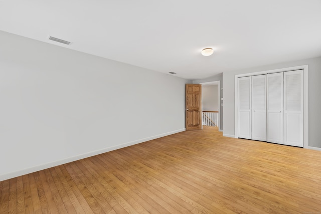 1182 N Main St, West Hartford, CT 06117 - unfurnished bedroom featuring light wood-style floors and a closet