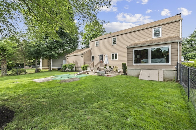 1182 N Main St, West Hartford, CT 06117 - back of property with a fenced backyard