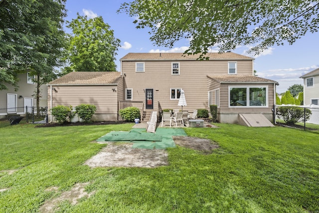 1182 N Main St, West Hartford, CT 06117 - rear view of house with a fenced backyard