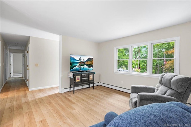 46 Union Dr, Ashford, CT 06278 - living area featuring a baseboard radiator and light wood-type flooring