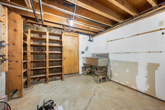 46 Union Dr, Ashford, CT 06278 - unfinished below grade area featuring a sink