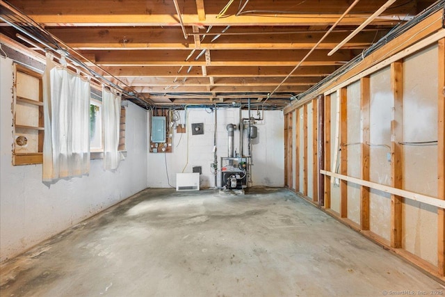 46 Union Dr, Ashford, CT 06278 - basement with electric panel and a heating unit