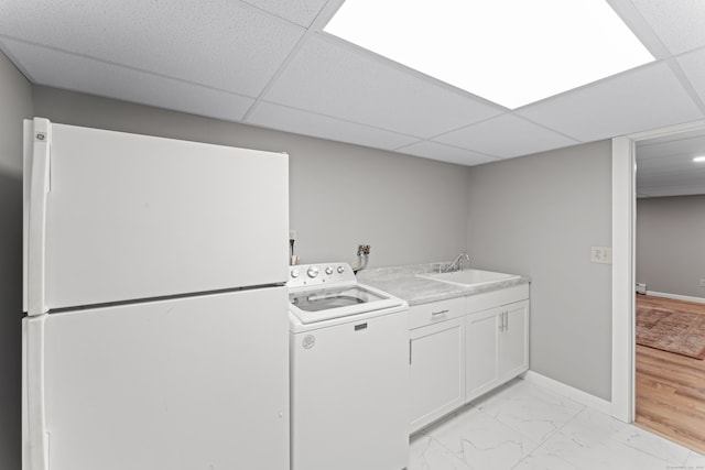 119 Debra Ln, Bristol, CT 06010 - laundry area with washer / clothes dryer and light marble finish floors