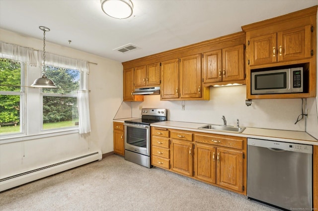 5 Hale Ct, Plainville, CT 06062 - kitchen featuring appliances with stainless steel finishes, under cabinet range hood, a baseboard radiator, light countertops, and brown cabinetry