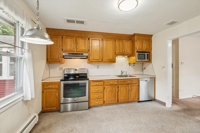 5 Hale Ct, Plainville, CT 06062 - kitchen featuring appliances with stainless steel finishes, under cabinet range hood, light countertops, and a baseboard heating unit