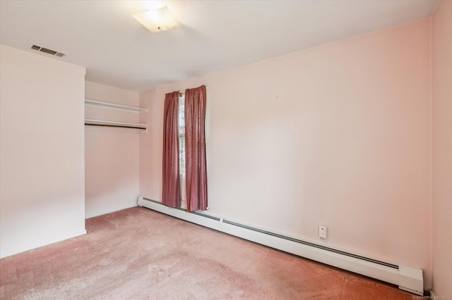 5 Hale Ct, Plainville, CT 06062 - unfurnished bedroom featuring a baseboard radiator, carpet floors, and a closet