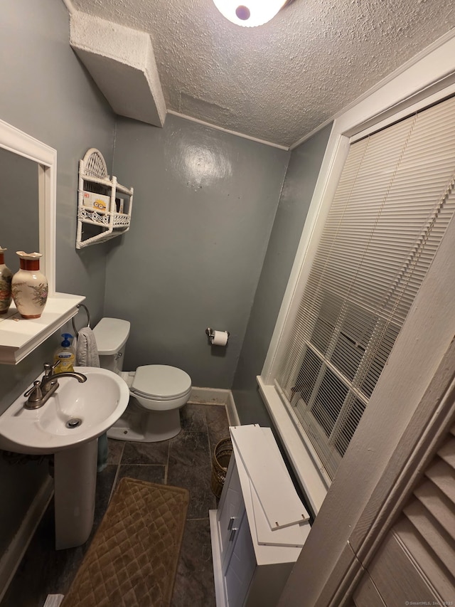 952 Boston Tpke, Coventry, CT 06238 - bathroom with a textured ceiling and toilet