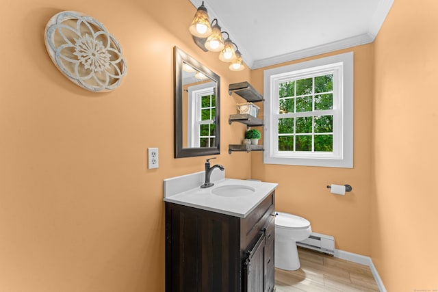 148 Depot St, East Windsor, CT 06016 - bathroom with baseboard heating, vanity, wood finished floors, and ornamental molding