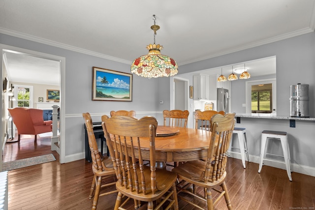 50 Spring Glen Dr, Granby, CT 06035 - dining space featuring dark wood-type flooring and crown molding