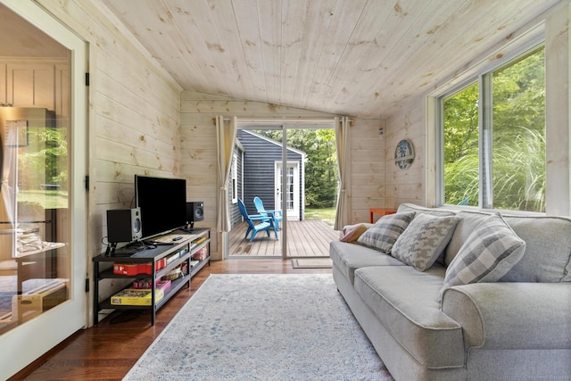 50 Spring Glen Dr, Granby, CT 06035 - living area featuring vaulted ceiling, dark wood-style floors, wooden walls, plenty of natural light, and wooden ceiling