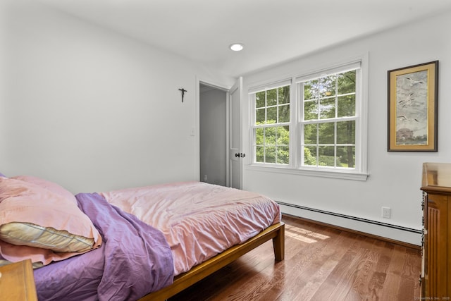 50 Spring Glen Dr, Granby, CT 06035 - bedroom with a baseboard heating unit, wood finished floors, and recessed lighting