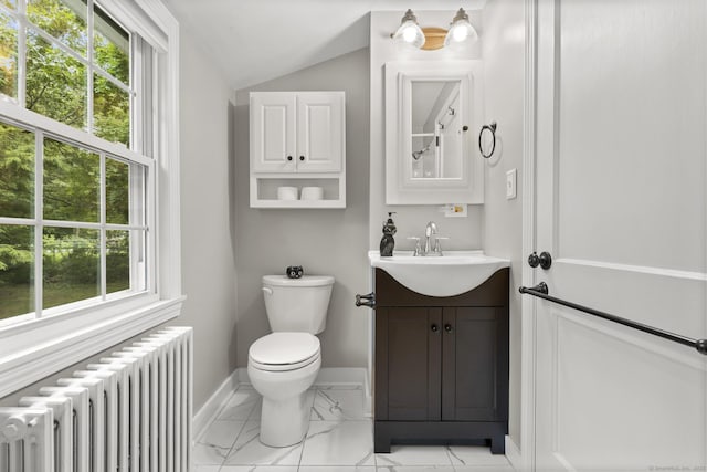 50 Spring Glen Dr, Granby, CT 06035 - bathroom with radiator heating unit, vanity, marble look tiles, and vaulted ceiling