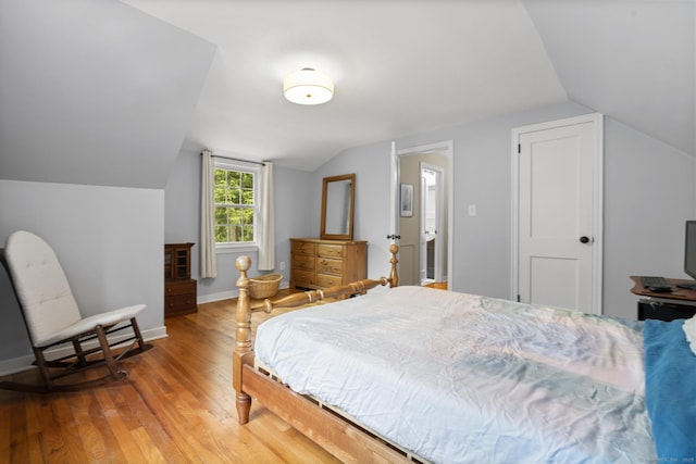 50 Spring Glen Dr, Granby, CT 06035 - bedroom with lofted ceiling and wood finished floors