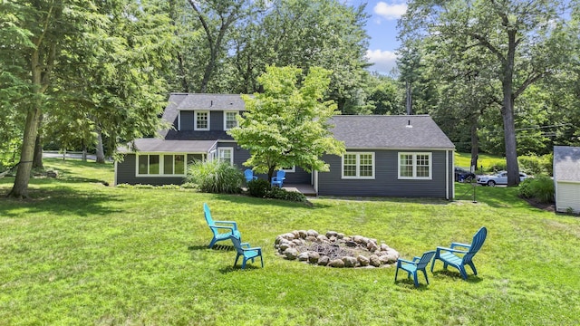50 Spring Glen Dr, Granby, CT 06035 - back of house with a fire pit and a lawn