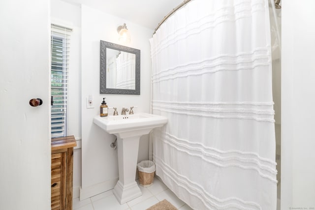 319 Main St, Wethersfield, CT 06109 - bathroom with tile patterned flooring and a sink