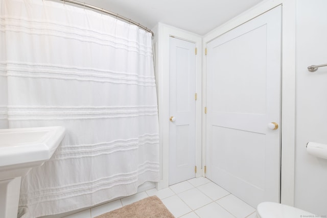 319 Main St, Wethersfield, CT 06109 - bathroom with tile patterned floors and curtained shower