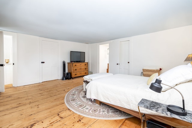 319 Main St, Wethersfield, CT 06109 - bedroom with light wood finished floors