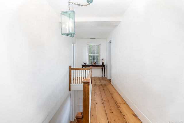 319 Main St, Wethersfield, CT 06109 - hall with light wood-style flooring and an upstairs landing