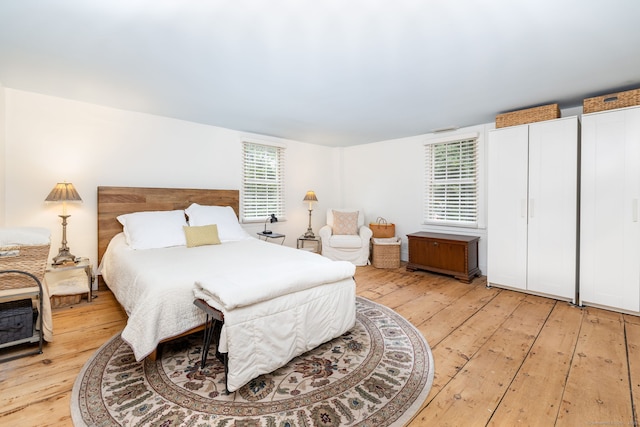 319 Main St, Wethersfield, CT 06109 - bedroom with light wood-type flooring